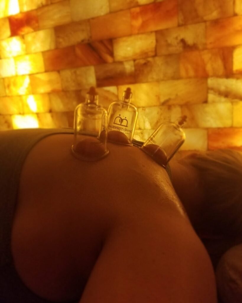 Cupping therapy treatment performed in the Himalayan salt room at Salt Spa Haven in Fayetteville, Georgia.